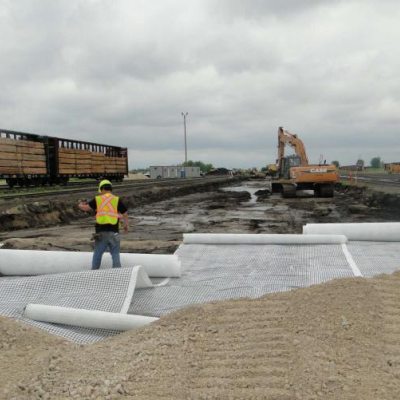 Geosynthetic reinforced mats